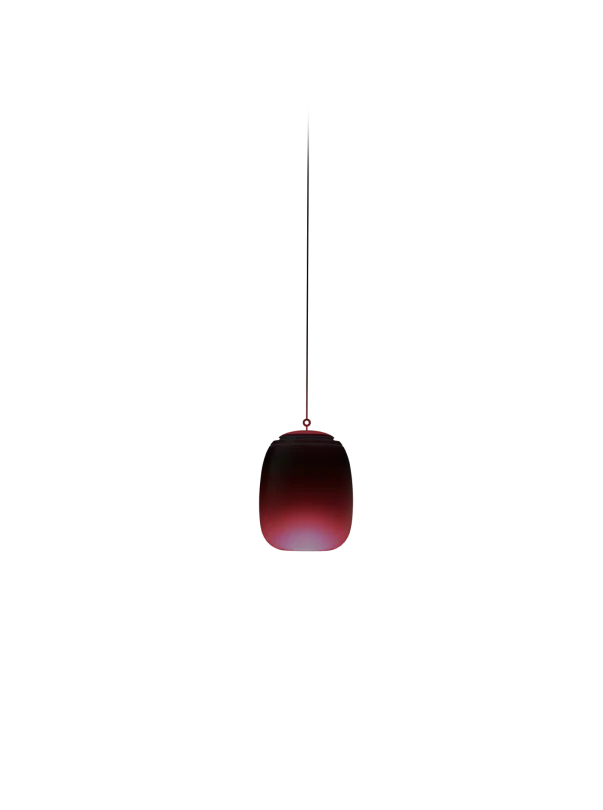 A single red pendant light hanging from the ceiling, glowing softly in the dark room.